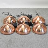 A set of six Tom Dixon copper coloured ceiling lights,