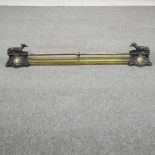 A 19th century French adjustable brass fender, with dog supports,