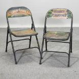 A painted metal folding chair,