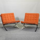 A pair of Barcelona style chairs,