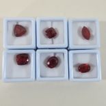 A collection of six natural unmounted rubies,