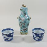 A Chinese porcelain vase and cover, 22cm high, on a matched stand,