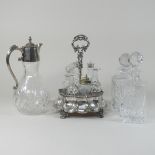A 19th century silver plated cruet stand, together with a claret jug,