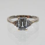 An 18 carat gold aquamarine and diamond ring,