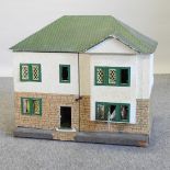 A vintage painted wooden dolls house,