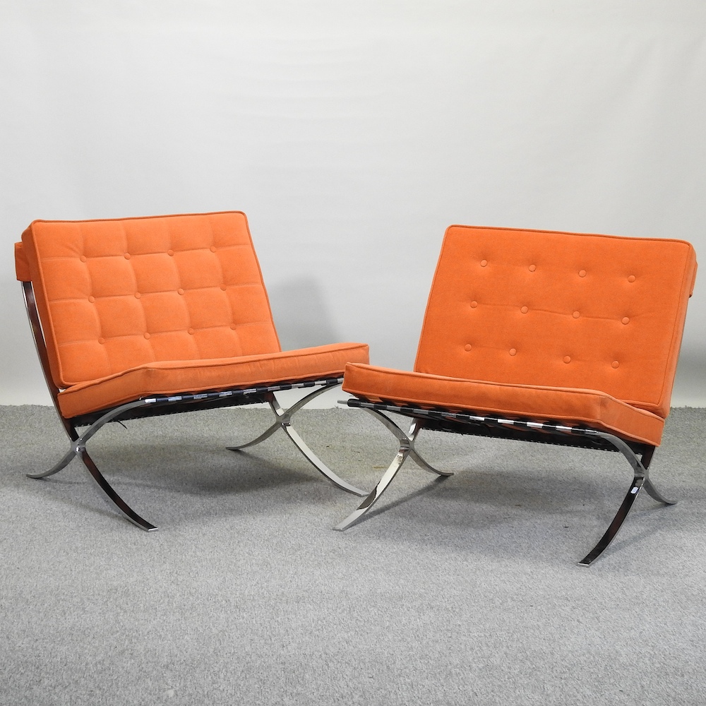 A pair of Barcelona style chairs,