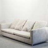 A modern grey upholstered three seater sofa,