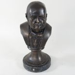 A bronzed bust of Winston Churchill,