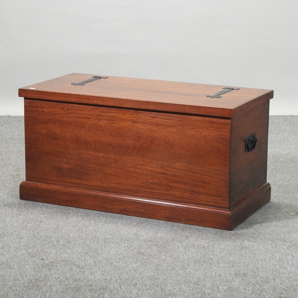 A hardwood metal bound trunk,