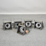 A set of five industrial Furse theatre lights