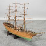 A scratch built wooden model of a three masted ship, 'Danmark', 93cm long,