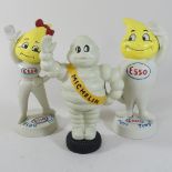 A pair of Esso money banks, 23cm high,