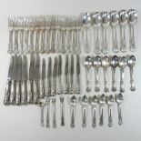 A matched set of thirteen George III and Victorian silver Kings pattern table forks,