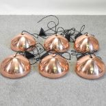 A set of six Tom Dixon copper coloured ceiling lights,