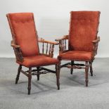 A near pair of early 20th century American walnut and red upholstered armchairs