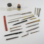 A Victorian seal top propelling pencil, together with various other propelling pencils,