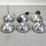 A set of six Tom Dixon silver coloured ceiling lights,