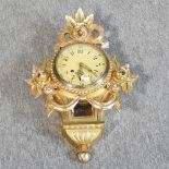 A gilt wood Cartel style wall clock,