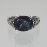 A 9 carat white gold opal ring,