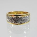 An 18 carat gold and diamond eternity ring,