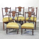 An Edwardian yellow upholstered and inlaid part salon suite