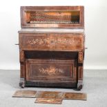 A late 19th century walnut and floral marquetry organ,