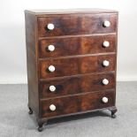 A 1920's walnut chest of drawers,