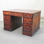 A Victorian mahogany partners desk, with a red leather inset top,