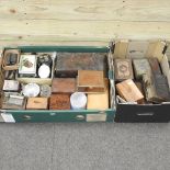 A collection of music box parts and boxes