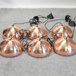 A set of six Tom Dixon copper coloured ceiling lights,