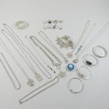 A collection of various silver and silver plated jewellery