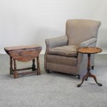 A 1920's grey upholstered armchair, together with a drop leaf occasional table,