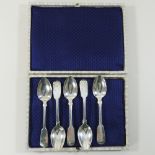 A set of five Victorian fiddle and shell pattern silver teaspoons, by Thomas Wheatley,