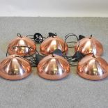 A set of six Tom Dixon copper coloured ceiling lights,