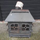 A cast iron log burner,