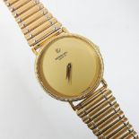 A 1971 Raymond Weil gold plated gentleman's wristwatch, the plain dial set with a diamond,