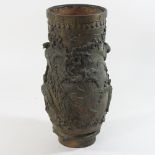 A 19th century Japanese bronze vase, relief decorated with birds and cherry blossom,