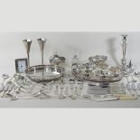 A collection of silver and plated items, to include two trays, a candlestick, scent bottles,