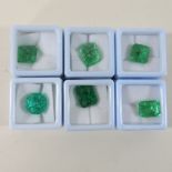 A collection of six natural unmounted emeralds,