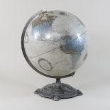 A modern terrestrial globe, on stand,