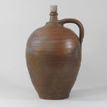 A 19th century salt glazed stoneware flagon,