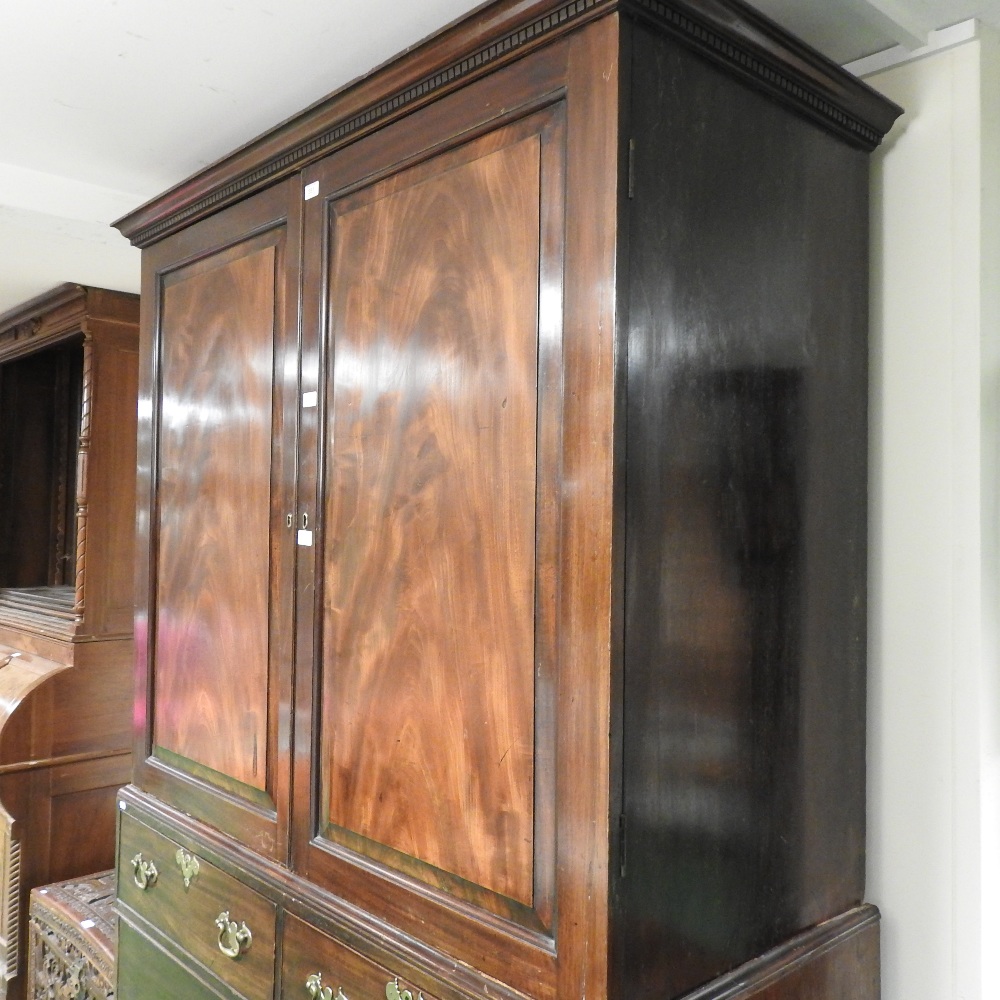 A George III mahogany linen press, with a dentil moulded cornice, - Image 9 of 11