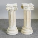 A pair of plaster Corinthian column pedestals,