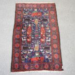 A woollen rug, with figures and animals, on a blue ground,