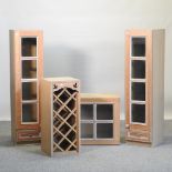 A pair of limed oak glazed kitchen units, 120cm high,