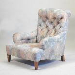 A Victorian Bridgewater Howard style upholstered armchair, by William Birch, on square tapered legs,