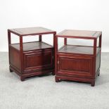 A pair of oriental rosewood bedside cabinets,