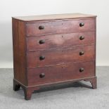 A George III oak chest of drawers,