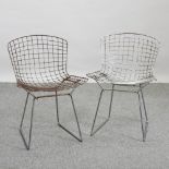 A pair of chrome wire chairs,