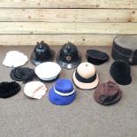 Two boxes of hats, to include fireman hats,